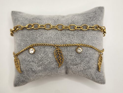 Dubbele armband met steentjes en veertjes